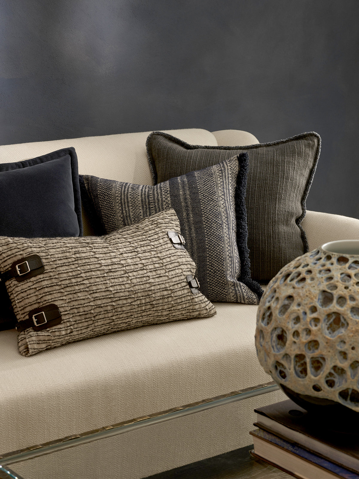 de Le Cuona fabrics—Vienna Cha Cha, Nara Buckle Fringe, Wildbeest Bison Wilderness—styled in layered interior.