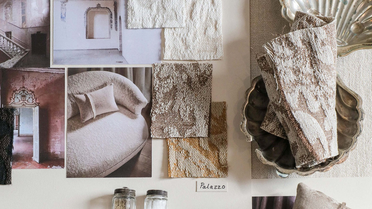 A styled interior design mood board featuring textured neutral fabrics, architectural photography, and home decor props on a light beige background.