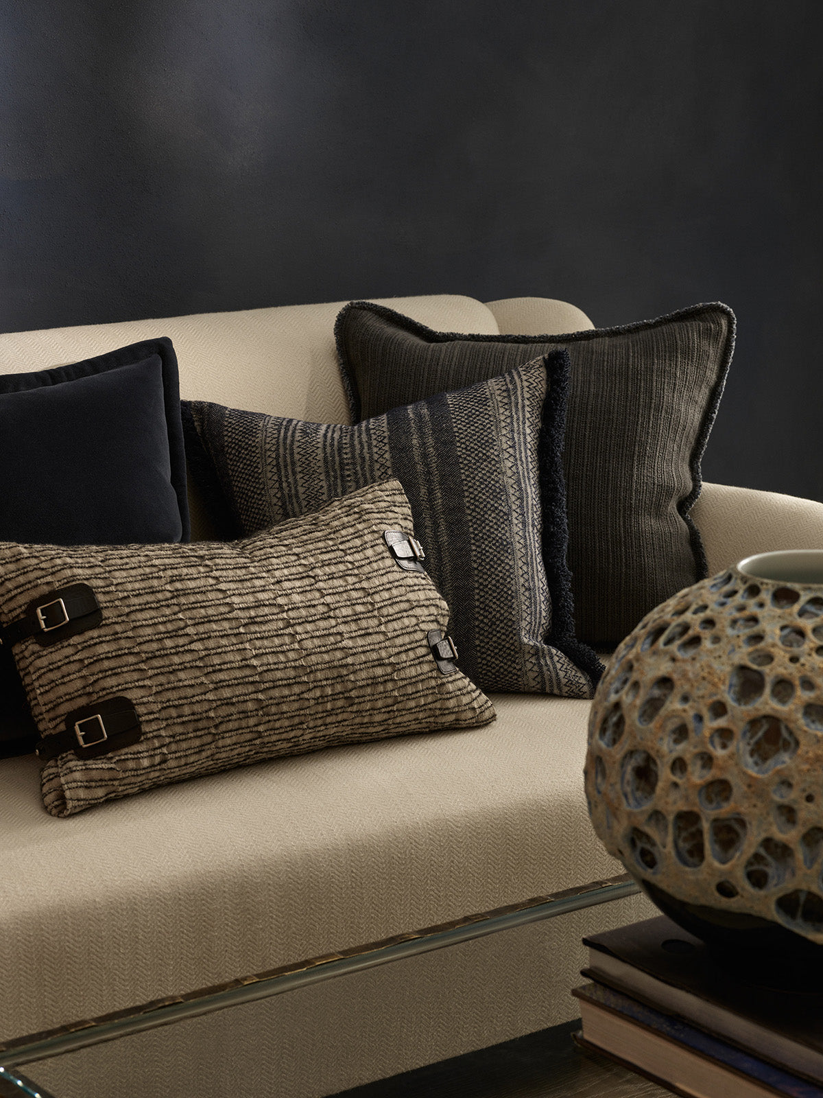 de Le Cuona fabrics—Vienna Cha Cha, Nara Buckle Fringe, Wildbeest Bison Wilderness—styled in layered interior.
