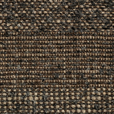 Close-up of a textured brown fabric with a subtle pattern